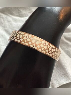 Coach C Logo bangle in ivory & rose gold